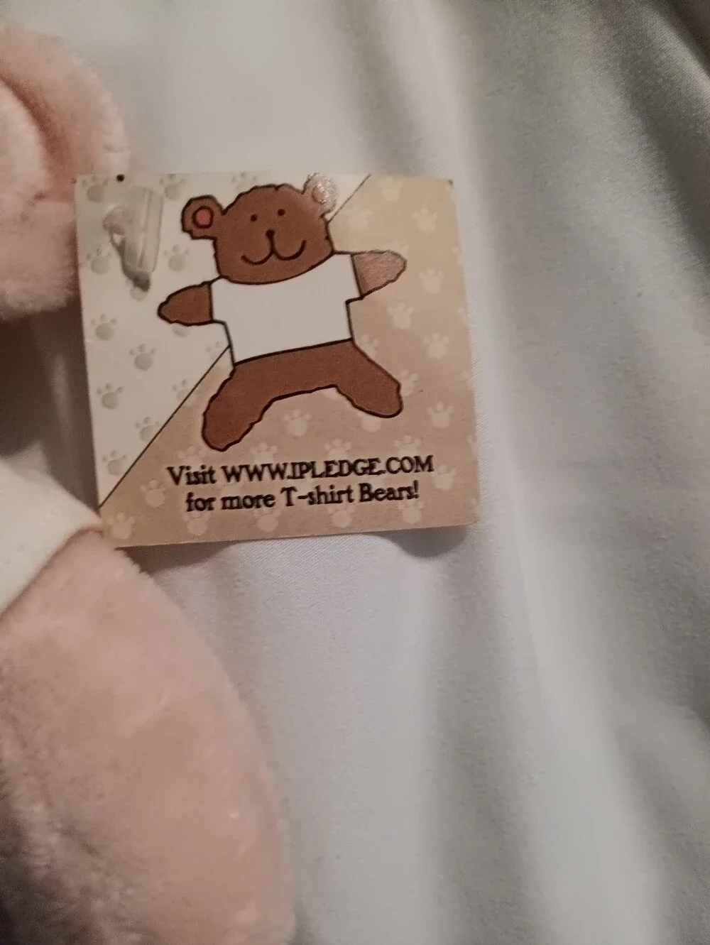 NWT USPS BREAST CANCER BEAR WITH POSTAGE STAMP ON BACK. WITH PINK JEWELS.